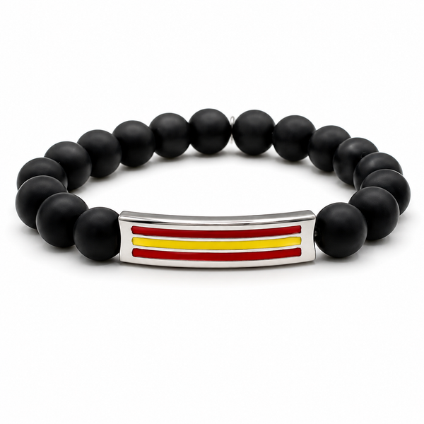 Pulsera de ónix negro mate con cuentas redondas y placa de acero con los colores de la bandera de España
