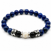 Pulsera Océano con cuentas de lapislázuli azul, ónix negro, piedra de luna y detalles plateados